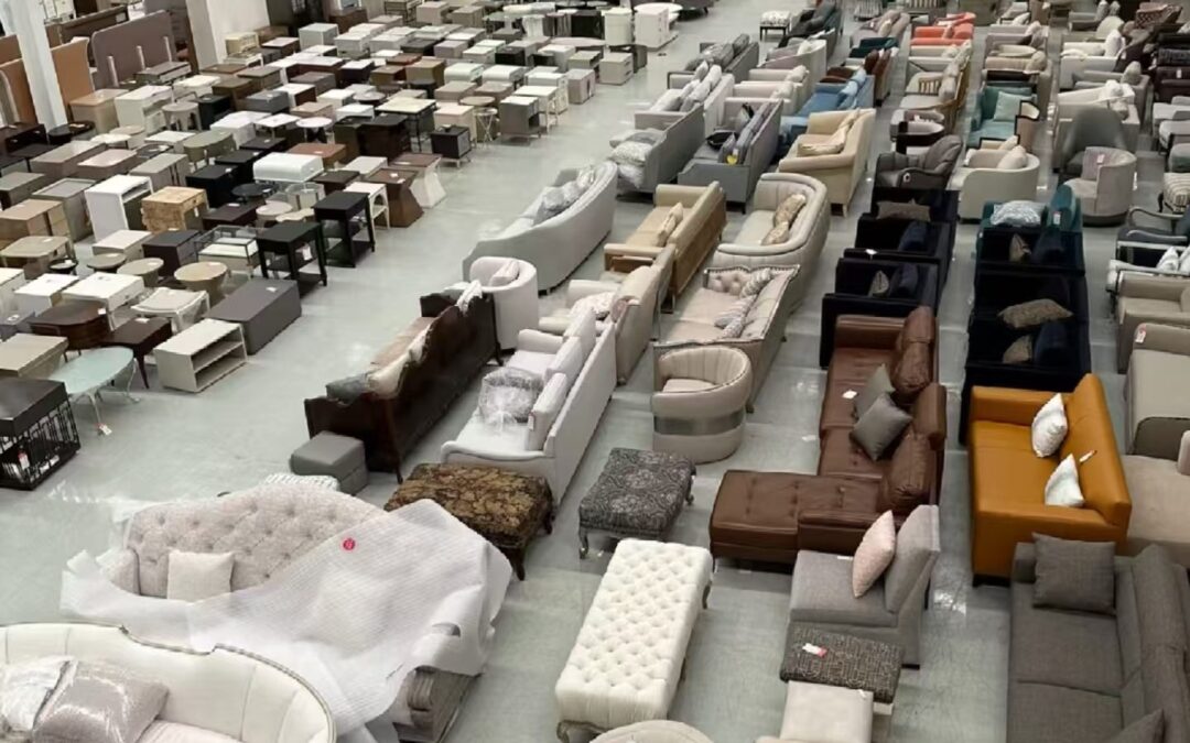 Large showroom displaying a wide range of upholstered furniture