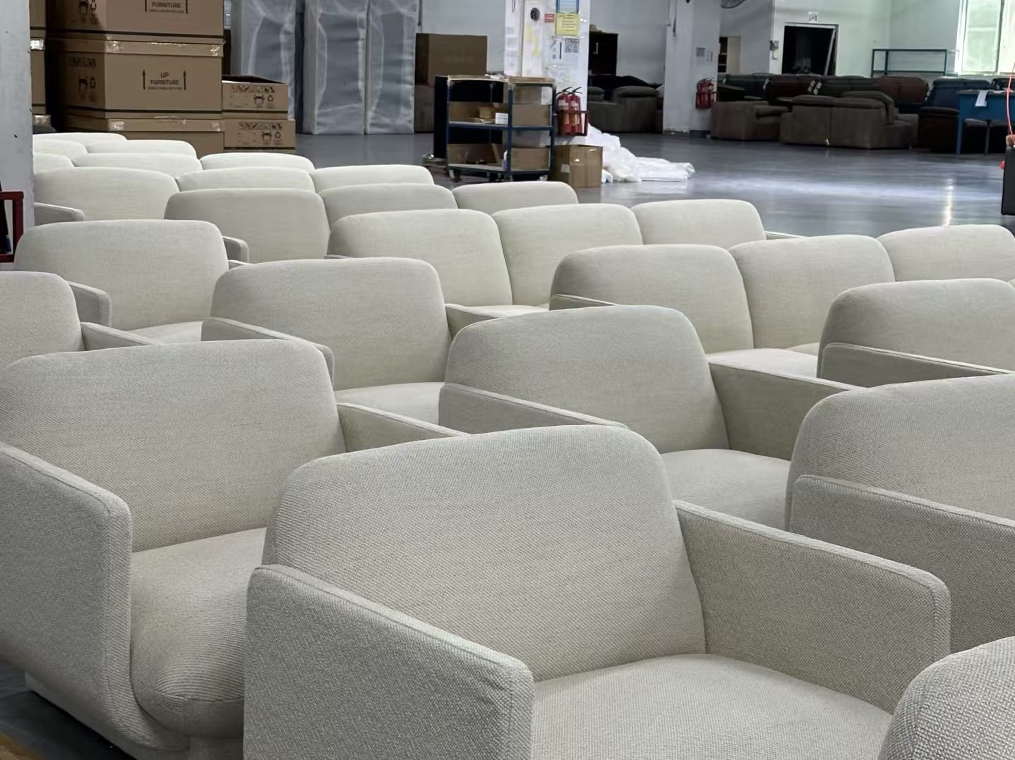 Finished upholstered chairs in a furniture production environment